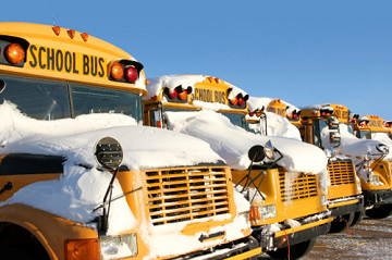 School Buses with Snow