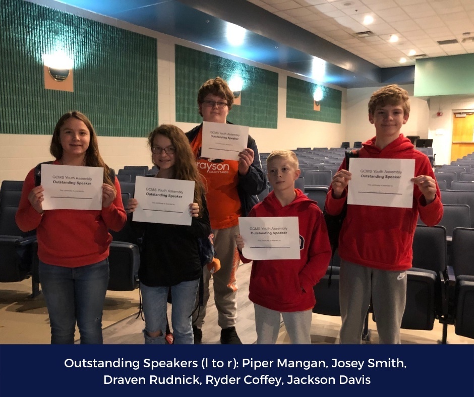 Outstanding Speakers (l to r) Piper Mangan, Josey Smith, Draven Rudnick, Ryder Coffey, Jackson Davis holding paper certificates in GCMS auditorium