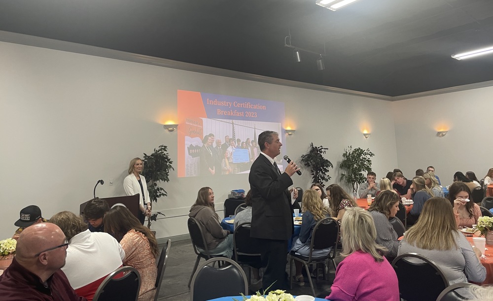 GC Tech Center director Matt Hayes speaks to a large group of community members and students at the CTE Certification Breakfast