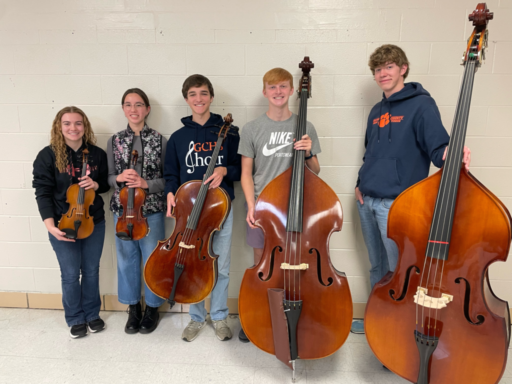 GHS All State Orchestra members with instruments