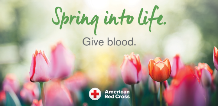 Image of tulips with Give Blood sign for Red Cross
