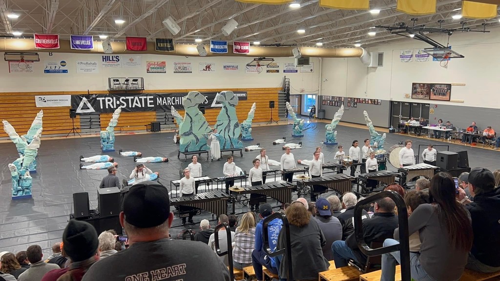 GCHS Winter Percussion performing in a gym